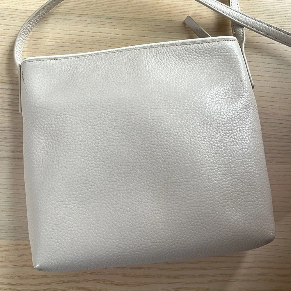 KATE SPADE Champagne Pebbled Leather Crossbody Bag with Gold Hardware White Trim